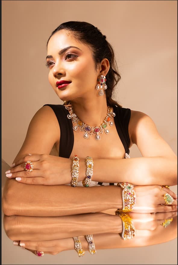 Gold bracelet on model with ocean view